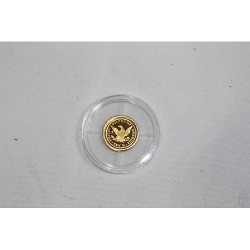 977 - GOLD EAGLE REPLICA .585 GOLD COIN - 0.5G