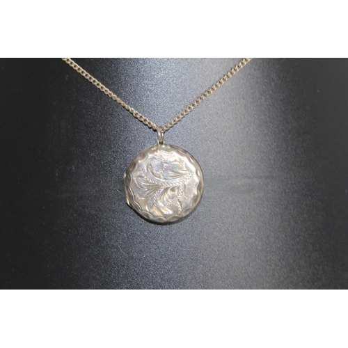 1042 - BRIGHT-CUT SILVER ROUND FORM LOCKET NECKLACE