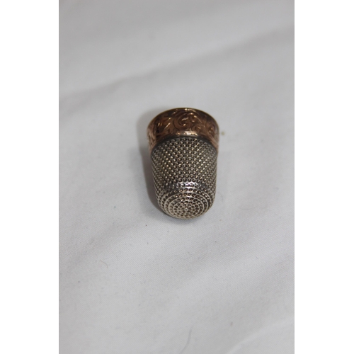 1135 - SILVER AND GOLD THIMBLE