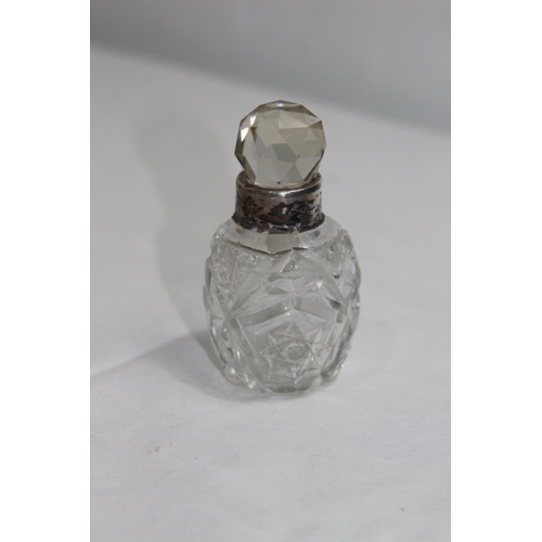 1143 - SELECTION OF FOUR SILVER COLLARED PERFUME BOTTLES, 3 WITH STOPPERS, VARIED DESIGNS AND DATES