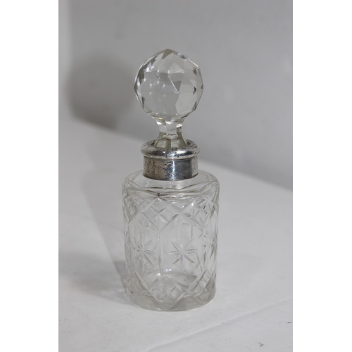 1143 - SELECTION OF FOUR SILVER COLLARED PERFUME BOTTLES, 3 WITH STOPPERS, VARIED DESIGNS AND DATES