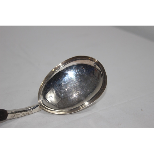 1147 - LARGE ASIAN SILVER PLATED SERVING SPOON WITH WOODEN HANDLE - 29CM LONG