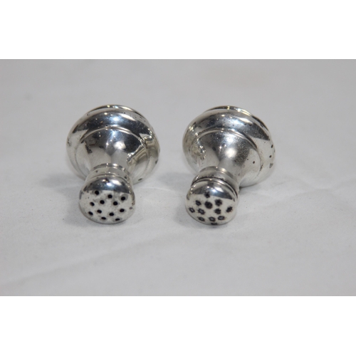 1148 - PAIR OF SILVER PEPPER POTS
3.5CM