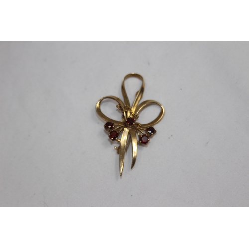 1229 - 9CT GOLD AND GARNET BROOCH - 5.7G TOTAL