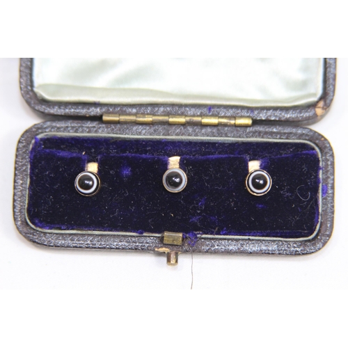 1241 - ANTIQUE CASED 3 X 15CT GOLD BUTTONS