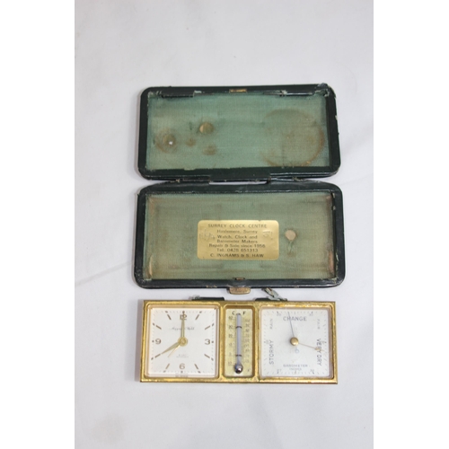 913 - MAPPIN AND WEBB GREEN LEATHER CASED CLOCK AND BAROMETER