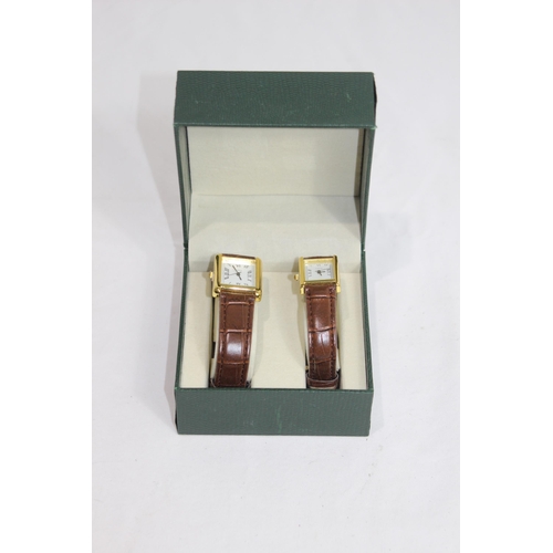 917 - BOXED HIS AND HERS WATCH SET