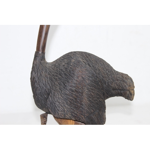 919 - CARVED WOODEN FIGURE OF OSTRICH AND ITS BABY SIGNED J. NGILA
30CM