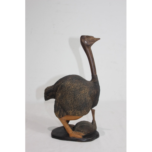 919 - CARVED WOODEN FIGURE OF OSTRICH AND ITS BABY SIGNED J. NGILA
30CM