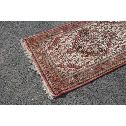 218 - VINTAGE EASTERN RUG
140 X 76CM