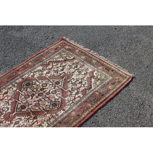 218 - VINTAGE EASTERN RUG
140 X 76CM