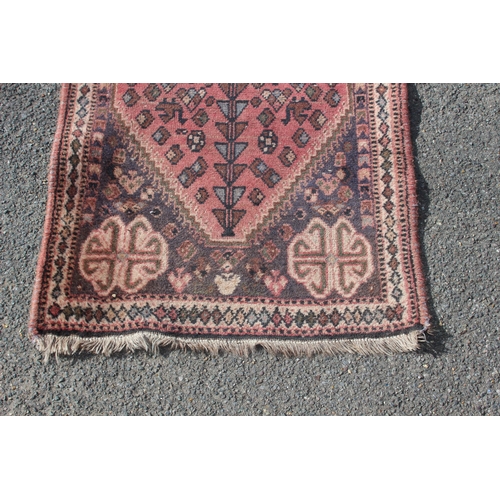 219 - VINTAGE EASTERN RUG
185 X 70CM