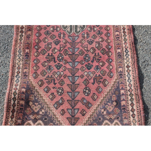 219 - VINTAGE EASTERN RUG
185 X 70CM