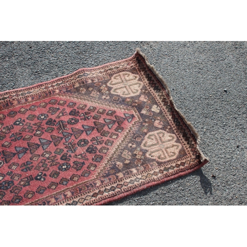 219 - VINTAGE EASTERN RUG
185 X 70CM