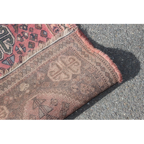 219 - VINTAGE EASTERN RUG
185 X 70CM