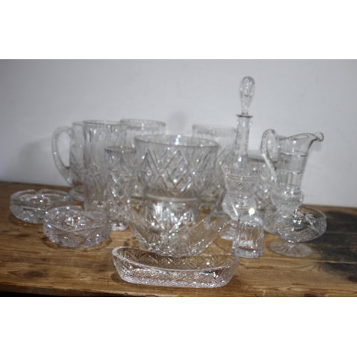 246 - LARGE QUANTITY OF CUT GLASS DECANTERS, BOWLS, JUGS ETC 
40CM