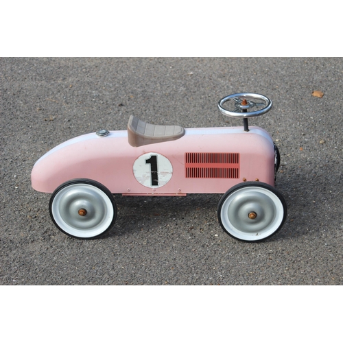 563 - TIN RIDE ON RACING CAR 
73 X 39CM