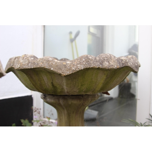 100 - PAIR OF STONE BIRD BATHS 
59 X 70CM