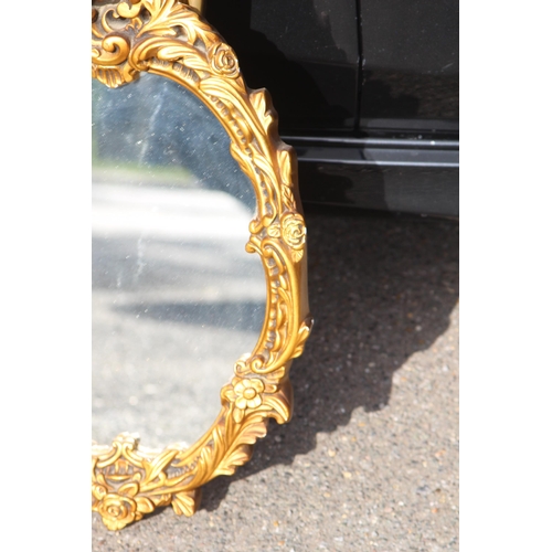 124 - 2 X ORNATE FRAMED MIRRORS 
89 X 55CM