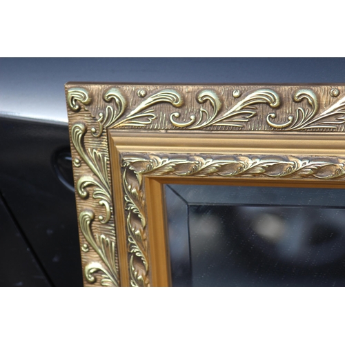 135 - ORNATE MIRROR
106 X 73CM