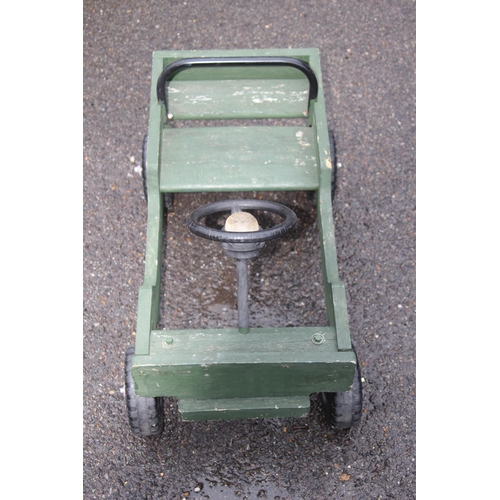 585 - VINTAGE GREEN PAINTED WOODEN JEEP BUDDYL WHEELS SIT IN TOY CAR