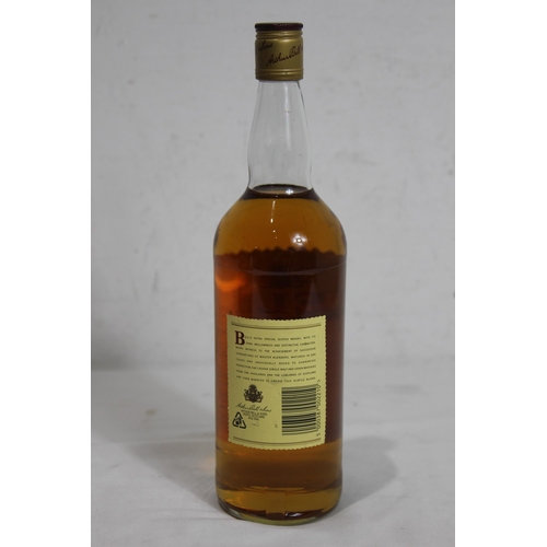 603 - I LITRE BOTTLE OF BELLS WHISKEY