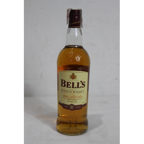 604 - I LITRE BOTTLE OF BELLS WHISKEY