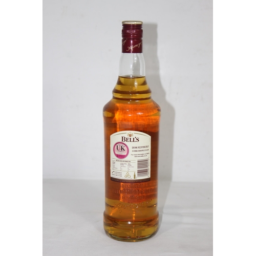 605 - I LITRE BOTTLE OF BELLS WHISKEY