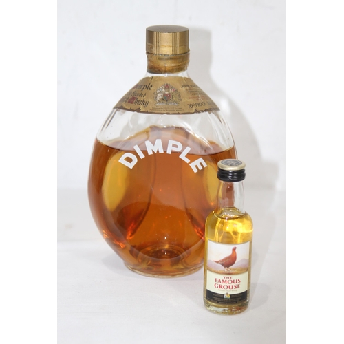 609 - BOTTLE OF DIMPLE WHISKEY - OPENED