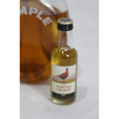 609 - BOTTLE OF DIMPLE WHISKEY - OPENED