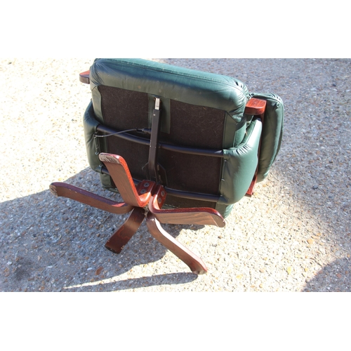 54 - GREEN LEATHER RECLINER SWIVAL CHAIR 
80 X 74 X 100CM