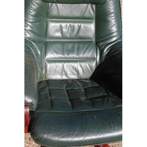 54 - GREEN LEATHER RECLINER SWIVAL CHAIR 
80 X 74 X 100CM