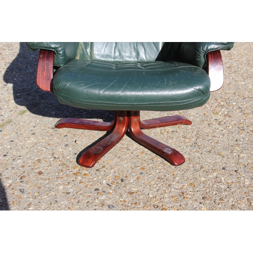 54 - GREEN LEATHER RECLINER SWIVAL CHAIR 
80 X 74 X 100CM