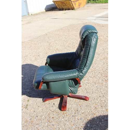 54 - GREEN LEATHER RECLINER SWIVAL CHAIR 
80 X 74 X 100CM