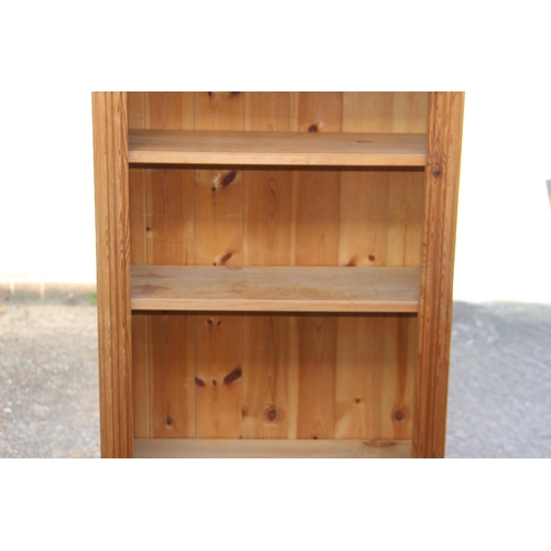 56 - NATURAL PINE BOOKCASE
67 X 30 X 139CM