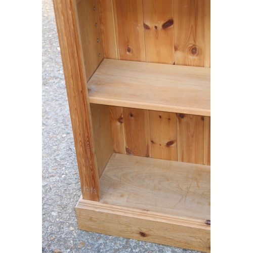 56 - NATURAL PINE BOOKCASE
67 X 30 X 139CM