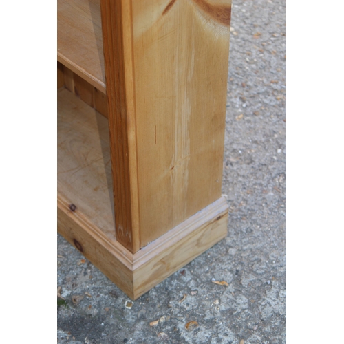 56 - NATURAL PINE BOOKCASE
67 X 30 X 139CM