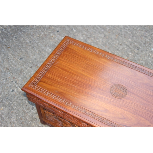 82 - ORENITAL CARVED COFFEE TABLE WITH SECRET MIDDLE 
80 X 41 X 40CM