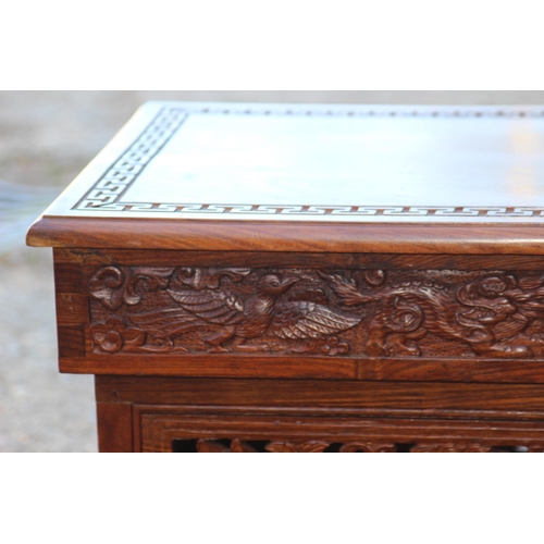 82 - ORENITAL CARVED COFFEE TABLE WITH SECRET MIDDLE 
80 X 41 X 40CM