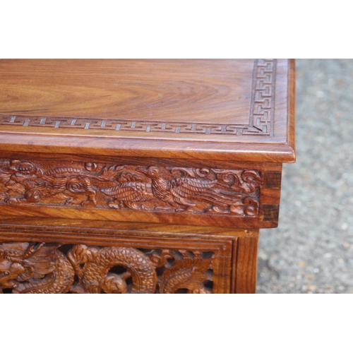 82 - ORENITAL CARVED COFFEE TABLE WITH SECRET MIDDLE 
80 X 41 X 40CM