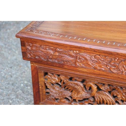 82 - ORENITAL CARVED COFFEE TABLE WITH SECRET MIDDLE 
80 X 41 X 40CM