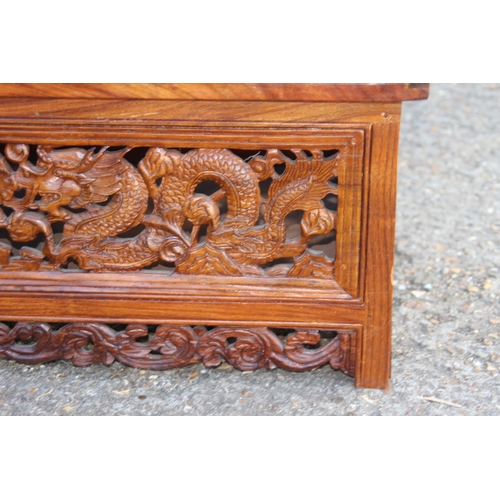 82 - ORENITAL CARVED COFFEE TABLE WITH SECRET MIDDLE 
80 X 41 X 40CM