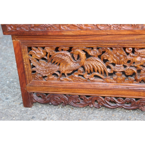 82 - ORENITAL CARVED COFFEE TABLE WITH SECRET MIDDLE 
80 X 41 X 40CM