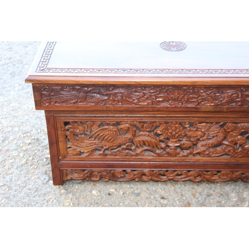 82 - ORENITAL CARVED COFFEE TABLE WITH SECRET MIDDLE 
80 X 41 X 40CM