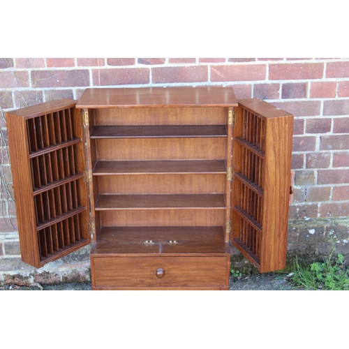 83 - ORIENTAL CD CABINET 
55 X 26 X 92CM