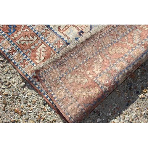 222 - VINTAGE GEOMETRIC EASTERN RUG
218 X 144CM