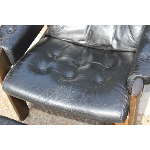 68 - PAIR OF RETRO EKORNES BLACK LEATHER CHAIRS AND FOOTSTOOLS 
80 X 72 X 98CM