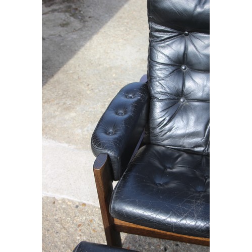 68 - PAIR OF RETRO EKORNES BLACK LEATHER CHAIRS AND FOOTSTOOLS 
80 X 72 X 98CM