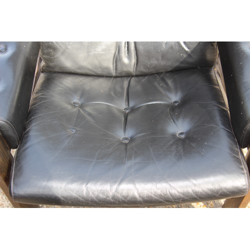 68 - PAIR OF RETRO EKORNES BLACK LEATHER CHAIRS AND FOOTSTOOLS 
80 X 72 X 98CM