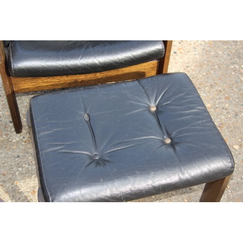 68 - PAIR OF RETRO EKORNES BLACK LEATHER CHAIRS AND FOOTSTOOLS 
80 X 72 X 98CM